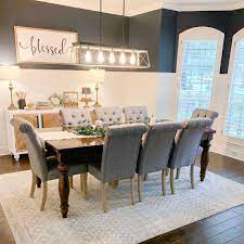 The dining room decor above uses a wooden table and a pair of wooden benches with an identic color. 2020 Interior Design Trends