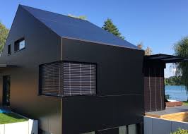 Fassadenbekleidung Aus Hpl Platten Geklebt Material Fundermax Exterior Friedberg Schmales Haus Ideen Fassade Haus Fassade