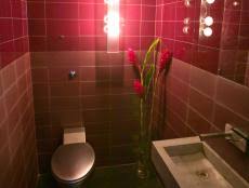 A half bath includes a toilet and sink, but not a shower or bathtub. 30 Half Bathroom And Powder Room Ideas You Ll Want To Steal Hgtv