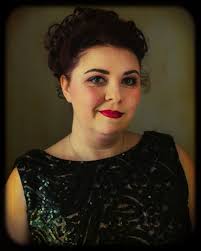 Sarah Holcomb as Mama Maddelena in Nine. Final three performances: Friday,  March 9 (8pm); Saturday, March 10 (8pm); and Sunday, March 11 (3 pm). For  tickets: (910)632-2285, thalianhall.org, or in the lobby