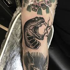 American traditional snake tattoo black and grey. Scottmove On Instagram Snake Head Done Parliamenttattoo Traditional Snake Tattoo Traditional Black Tattoo Black Ink Tattoos