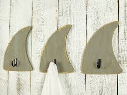 All that work you imagined has already been done by expert craftspeople, who shaped and colored wood so that your home will feel like a bungalow by the bay. Shark Decor Decorative Wall Hooks Beach Bathroom Towel Hooks Nautical Bathroom Decor Shark Decor Shark Bathroom
