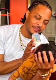 Teonny - Awww look at this photo of T.I. feeding his grandson King Jr.,  even though the people on Tik Tok who aren't real bloggers or jouranlists  said it wasn't King's baby,