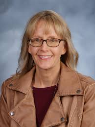 Tabby Rabenberg, Horizon principal, talks about her library media  specialist Kathy Berg & library assistants Laura Bahr & June Palmer during  National Library Week: “Kat has led the charge in co-teaching with