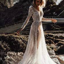 A gold belt gave the dress shape, and it featured a low neckline and was backless as well. 29 Stunning Silver Wedding Dresses For Bold Brides