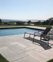 Rubber patio tiles are able to withstand heavy objects being dropped on them without breaking. Granite Pavers Chatham Blue Stonewood Products