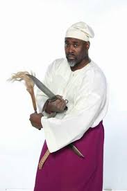 African Martial Arts Master Kilindi Iyi Holding A Custom Made Damascus Bowie Martial Arts Mushroom Culture Kumite