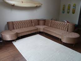 We have everything you are looking for! Vintage Newport Chesterfield Sectional Sofa With Hideaway Spaghetti Lamps