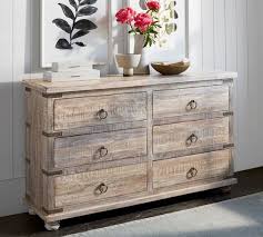 Reclaimed pine in a honey finish. Kaplan Reclaimed Wood 6 Drawer Wide Dresser Pottery Barn