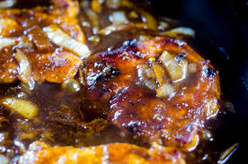 Vegetables and pork chops are cooked and seasoned with onion soup mix. French Onion Smothered Pork Chops Mooshu Jenne