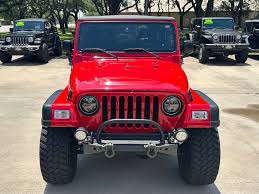 Image result for Flame Red 2005 Jeep