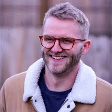 From my first headshot to my most recent. In addition to six years between  these two photos, there's also: