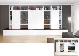 Verkaufe meine wohnwand ( ohne deko ) farbe braun, vorderfront hochglanz weiß. Schiebeture Urbana Mobel