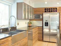 This will help in giving it a clearer appearance. Striking Zebra Wood Cabinets Fill This Contemporary Kitchen With Style The Stainless Steel Appliances Provide Striking Contra Small Modern Kitchens Kitch