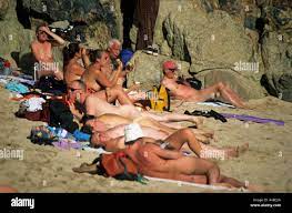 Nudists on beach Porthcurno Cornwall England UK Europe Stock Photo - Alamy