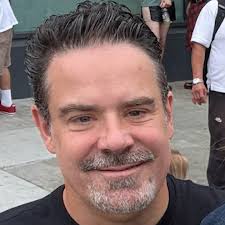 What is the location of the street corner in the 1956 photo in San  Francisco?