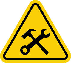 Under construction sign. Warning sign under construction. Yellow triangle  sign with crossed hammer and wrench icon inside. Caution at the construction  site. Workers, machinery and other obstacles. 22945737 Vector Art at  Vecteezy