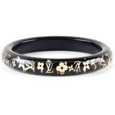 Louis Vuitton Black Gold Lucite Inclusion Bangle Bracelet 317 Liked On Polyvore Featu Black Gold Jewelry Yellow Gold Bangle Yellow Gold Bangle Bracelets