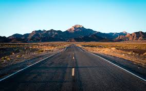 A mountain is a large landform that rises above the surrounding land in a limited area, usually in the form of a peak. Endless Road Wallpaper 4k Mountain Range Landscape Death Valley Nature 3909