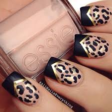 Black And White Cheetah Print Nails Leopard Print Nail Design Made Classier By Using Gold Striping Tape Black Chevron Tips Nailart Nail Leopard Print Nails Cheetah Nail Designs Leopard Nails