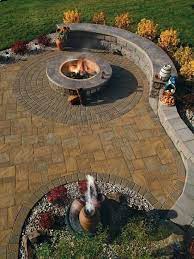 Stamped Concrete Patio With Landscaping Wall Retaining Wall Love The Shape And The Fire Pit Not So Much Teh Stamp Or S Backyard Patio Backyard Patio Stones