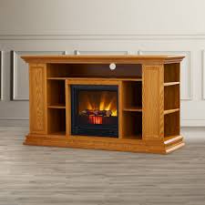 This sturdy electric fireplace tv stand offers a classic look and a 5000 btu powerful heating system to make the room cozier. a fairly priced and highly functional large fireplace tv stand that offers variable fire glow feature alongside 3 heat settings to create the atmosphere you desire. Bedroom Tv Stand With Fireplace Novocom Top