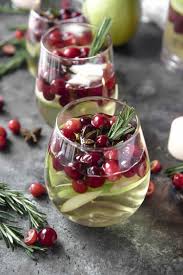 You Ll Be Dreaming About This White Christmas Sangria Long After The Holidays Have C Christmas Sangria White Christmas Sangria Recipe Christmas Sangria Recipes
