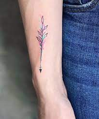 19 Arrow Tattoos That Are Surprisingly Chic Arrow Tattoos For Women Watercolor Arrow Tattoo Bow Tattoo Designs