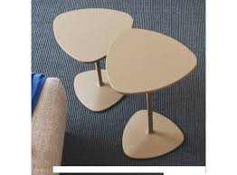 Silhouette is an extendable table with a sophisticated minimalist design, softly rounded edges and a slender frame in coated aluminium with a top available both in wood and in ceramic. Coffee Table Cb5061 Islands Connubia Calligaris