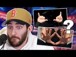 Guess the Wrestler by Their Signature Hand Gesture!