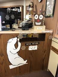 Polar Bear Blowing Snow Flakes At The Milan Library Drop Box Library Decor Library Displays School Library