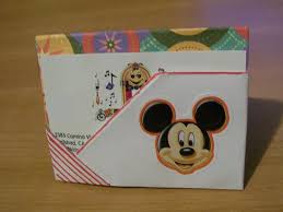 Origami graduation card how to fold an origami graduation card. How To Make An Origami Business Card Holder Lovetoknow