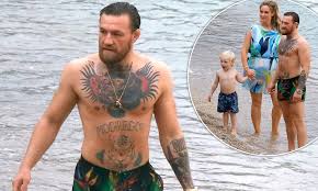 Although he had noticed her before, the irishman had his first conversation in the club. Conor Mcgregor Relaxes On The Beach With Girlfriend Dee Devlin And Children Conor Jnr And Croia Daily Mail Online