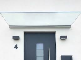 Vordach Dura Plus An Weisser Fassade Vordach Glas Glasvordach Hausturuberdachung