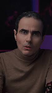 وهَذَا اللّيلُ أوسَعَني حَنيناً ‏فَمَزّقَ ما تَبَقّى مِنْ ثَبَاتِي ‏تَلُوحُ  الذّكرَياتُ بِكُلَّ دَربٍ ‏لِأَهرُبَ مِنْ شَتَاتِي لِلشّتاتِ ‏ومَابٍي غيرُ  شوقٍ لا يُداوى ‏وبَعضُ الشّوقِ أَشبَهُ ...