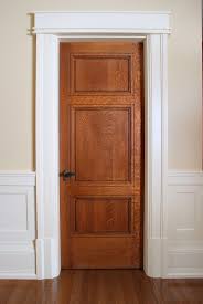 Custom 3 Panel Quarter Sawn White Oak Interior Door With Craftsman Style Painted Door Casing And Custom Door Frame Molding Oak Interior Doors Moldings And Trim