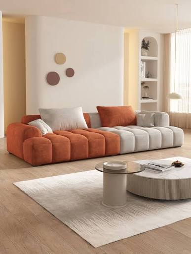 Four seater sofa reupholstery project in clay fabric tones