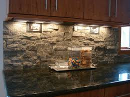 Common tiles you can choose from are stone, marble, or glass tiles that would give the kitchen a stunning background if combined with other elements. Stacked Stone Kitchen Backsplash Ideas Decoor