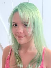 Today's fun challenge, she wanted pastel teal mermaid hair! She came in  with about 5 inches of level 7 roots and the rest of her hair had red/  orange old color. Also