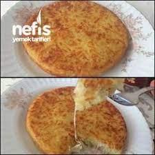 tavada kasarli rende patates boregi puf noktasi rendelenmis patatesleri sikin o cikan su hem pismesini engelliyor hemde cig patates tadi afiyet o