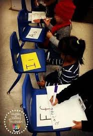 Musical Chairs Walk Around The Room When Music Stops Say Your Letter And Write It On Whi Alphabet Preschool Kindergarten Interventions Kindergarten Activities