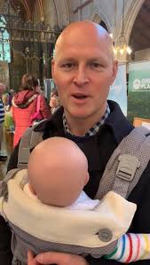 Max with a very young member of Cheltenham's community!