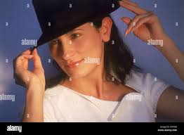 Hat pose hi-res stock photography and images