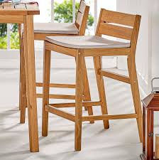 The frame of this bar stool is crafted from metal and can be stacked. Riverlake Outdoor Patio Ash Wood Counter Stool Contemporary Modern Furniture Lexmod