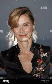 French actress Anne Consigny poses for photographers during the 21th  Cabourg Romantic Days Film Festival in Cabourg, France,