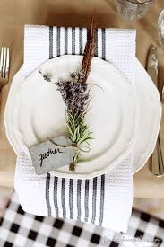 A colorful fall table setting with a purple napkin, a candle mini lantern. Colourful Place Settings Kikiinteriors Com