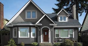 Dark gray house with white trim. 7 Dark Grey Siding Designs Using White Trim Allura Usa