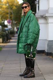 The One Winter Trend You Can Wear Until 2030 Oversized Puffer Coat Winter Trends Fashion Outerwear Trends Oversized Puffer Coat Winter Fashion Outfits