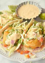 A bad fish taco is worse than a bad chicken taco. Try These Amazing Baja Fish Tacos Served In A Cozy Warm Tortilla With Pickled Cabbage Slaw Pico Fish Tacos With Cabbage Fish Tacos Recipe Baja Fish Taco Recipe