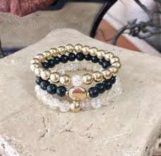 Black And Gold Bracelet Set Gold Bracelet Set Black Onyx Bracelet Gemstone Bracelets Etsy Gold Bracelet Set Onyx Bracelet Black Onyx Bracelet